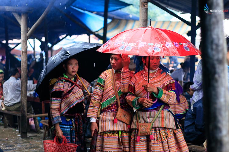 Local girls beautifully dressed in Bac Ha market